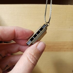 Vintage Mini harmonica pendant.